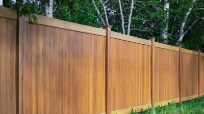 Nice new wooden privacy fence around house