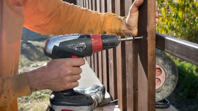 fencing contractor building wooden fence