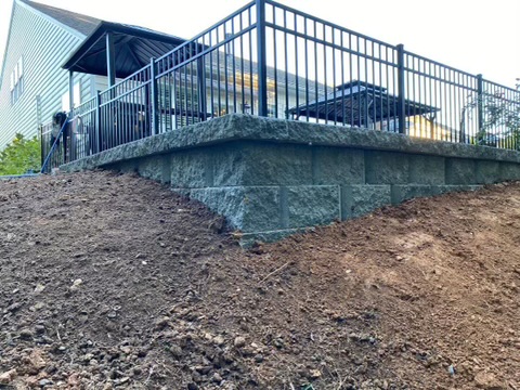 Black Aluminum -Three Rail Flat Top - Set on Retaining Wall