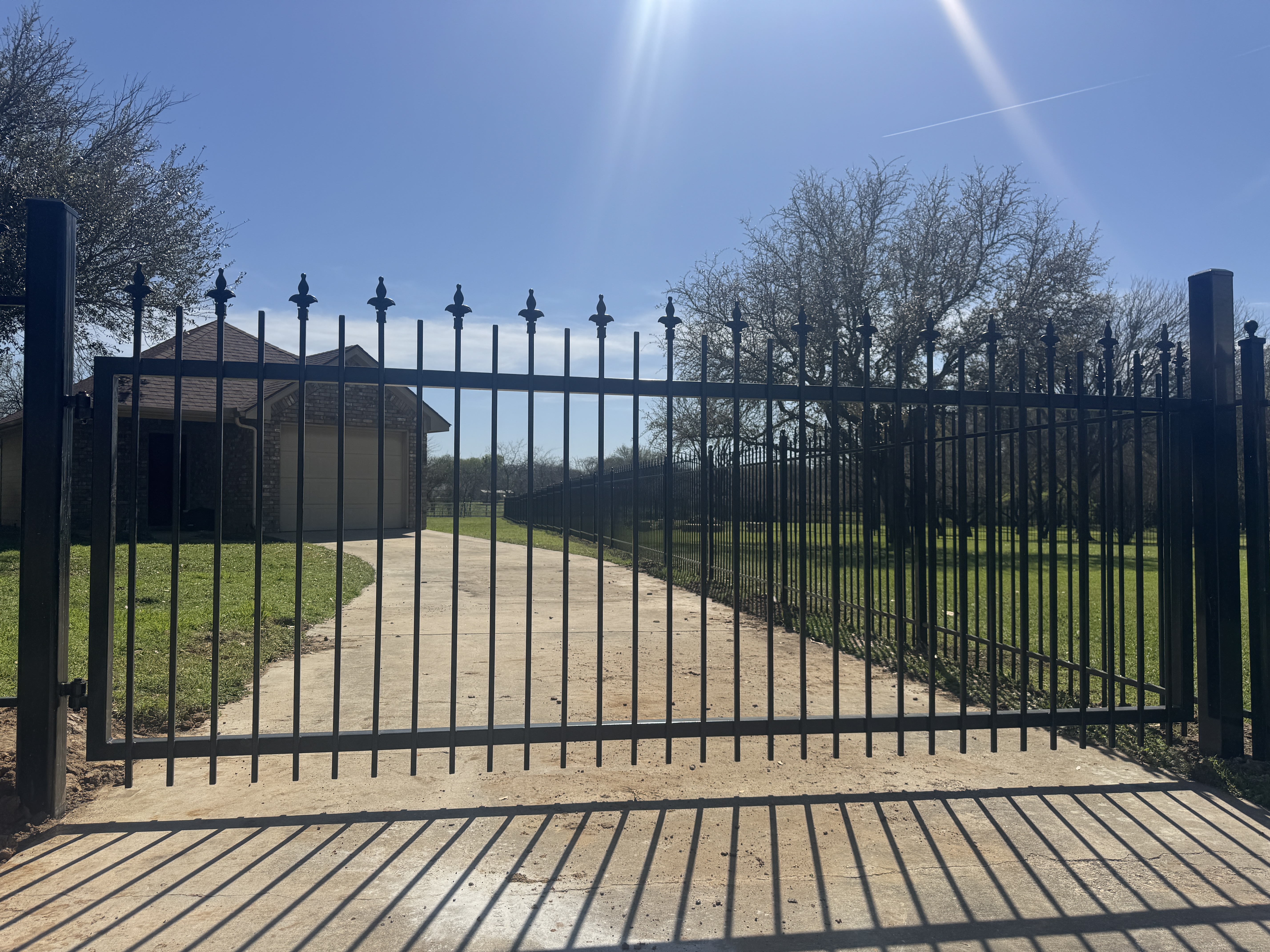 Aurora - custom 14' wide driveway gate, matching style of the fence