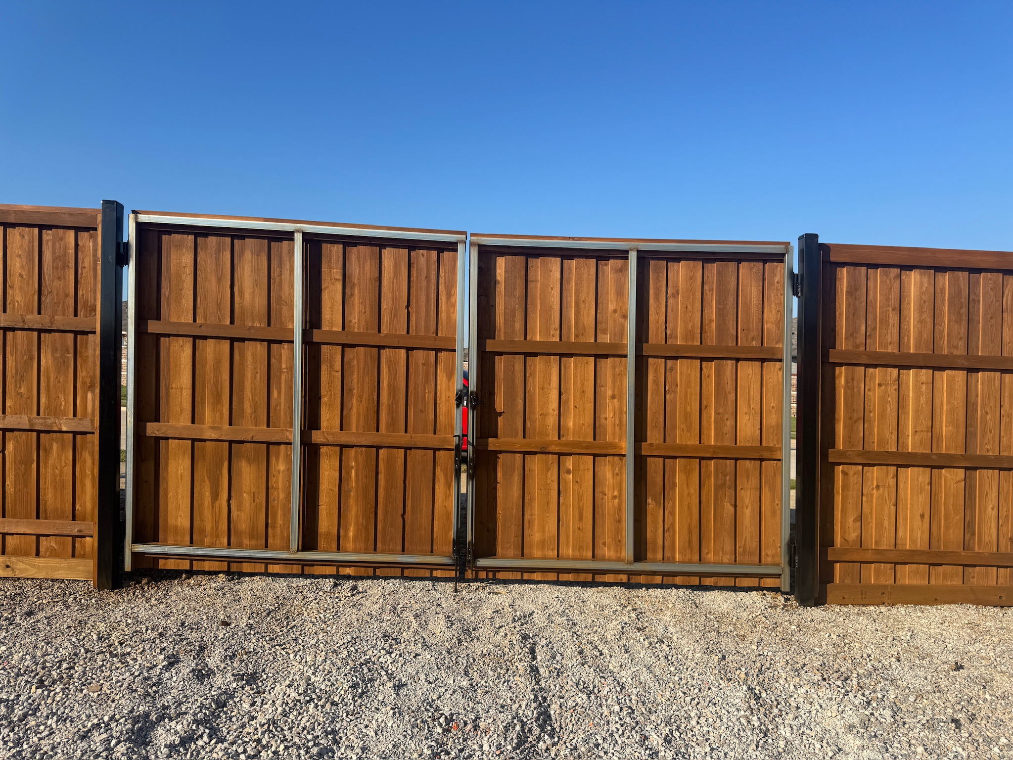 15' wide double gate with metal frame and heavy gauge 4" posts