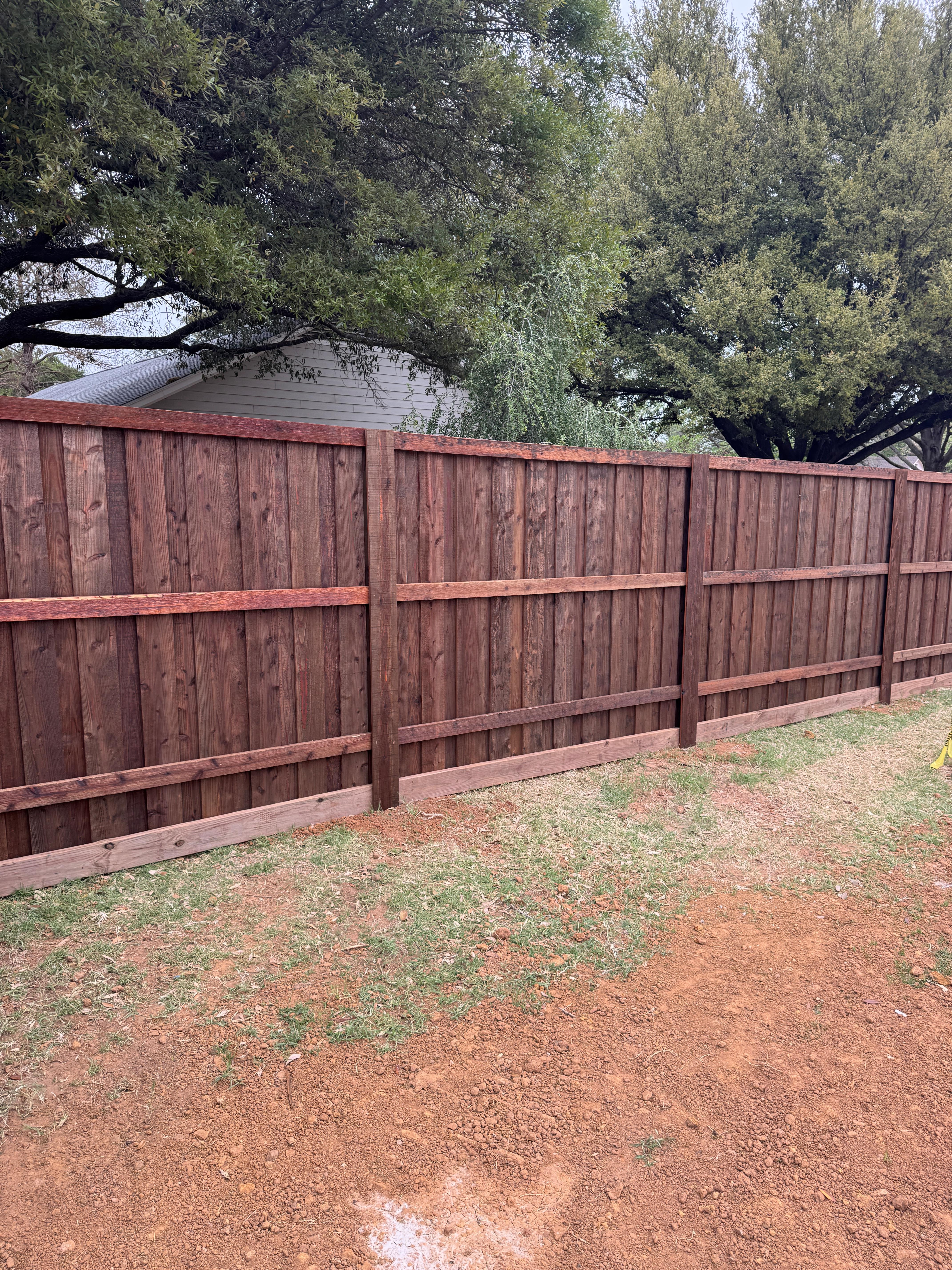 Double Oak - 6' cedar board on board with trim, using PostMaster+ posts