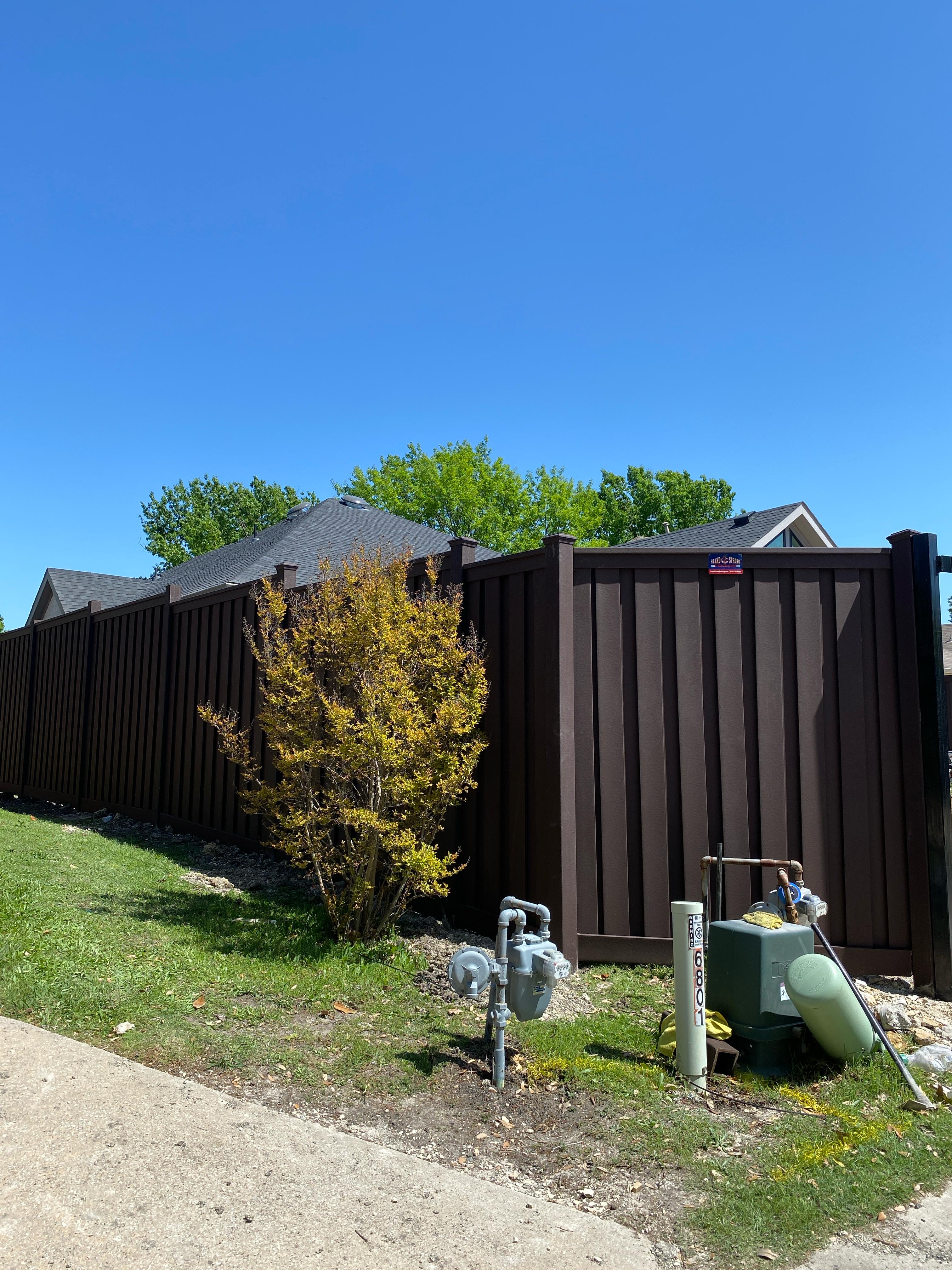 Stepped 8 ft high trex fence