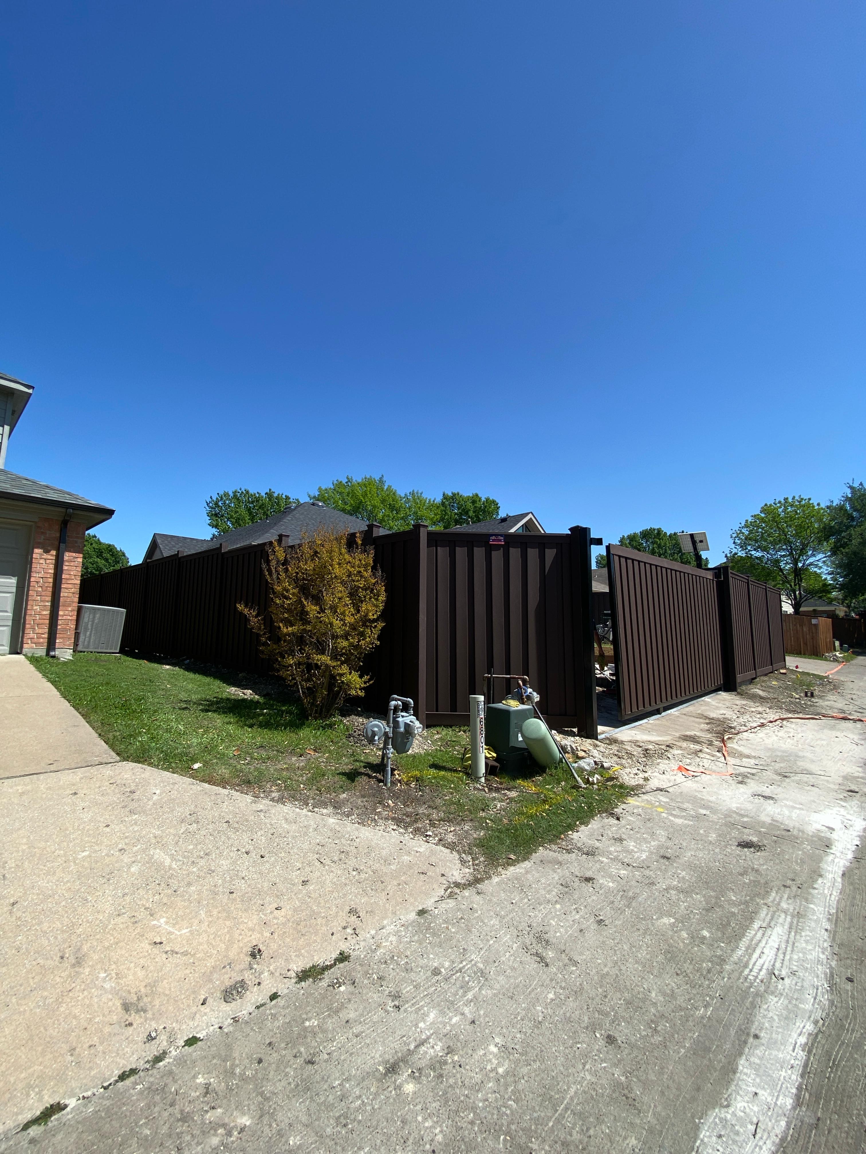 Full view Trex fence with automated sliding gate (solar)