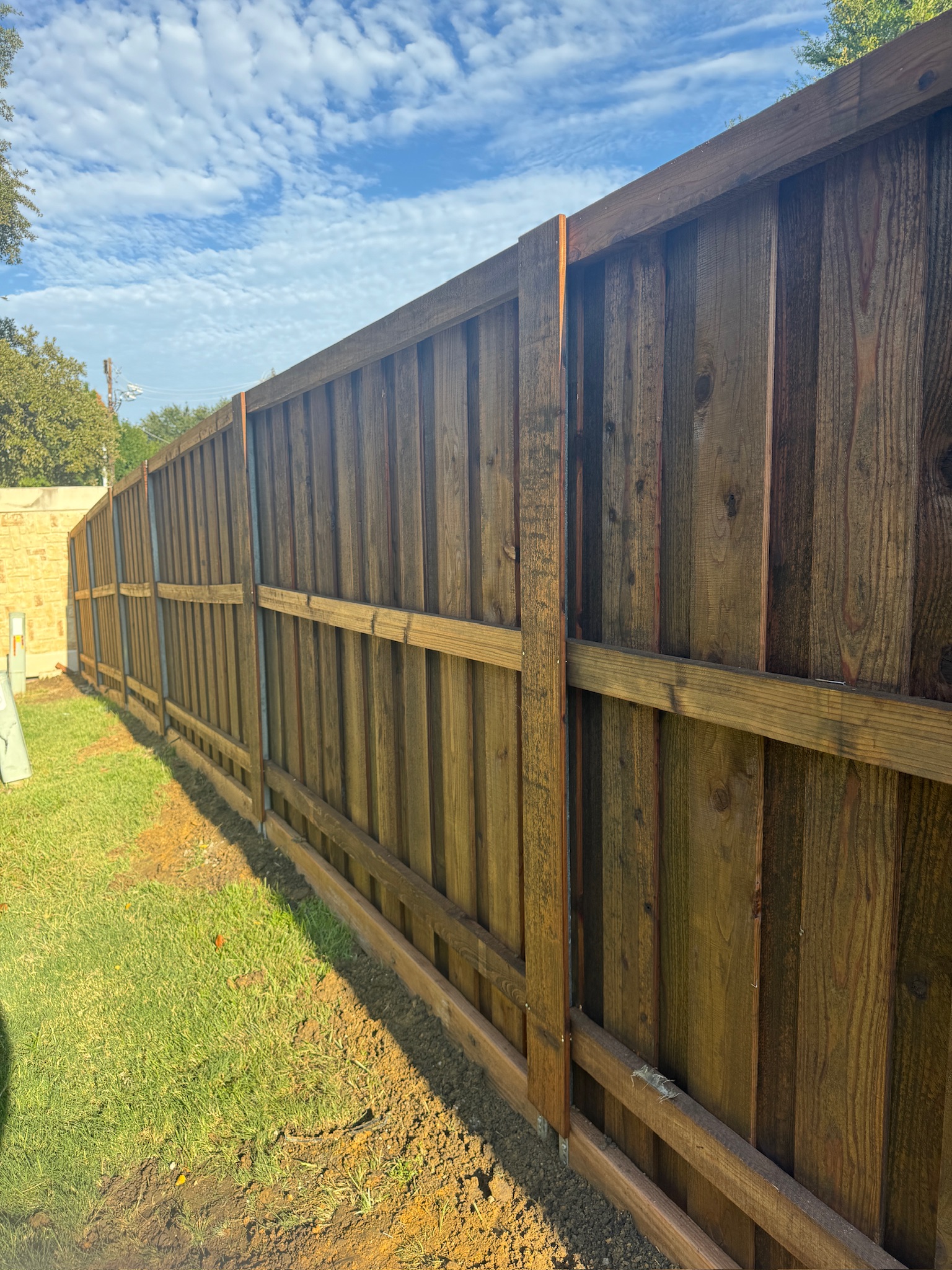Flower Mound - 6' cedar board on board with trim, include hidden posts, custom Walnut stain